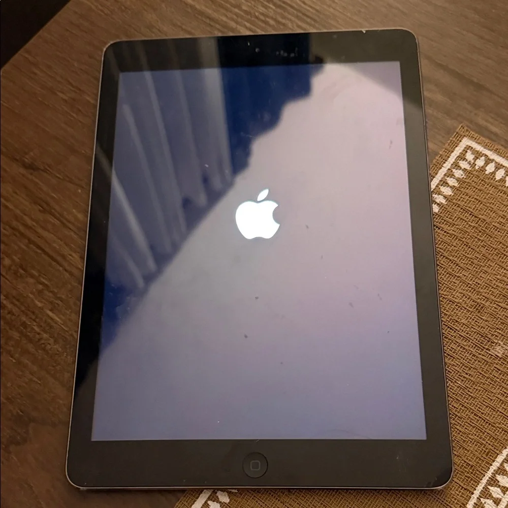 Just part blocked Apple Tablet with Black Frame
